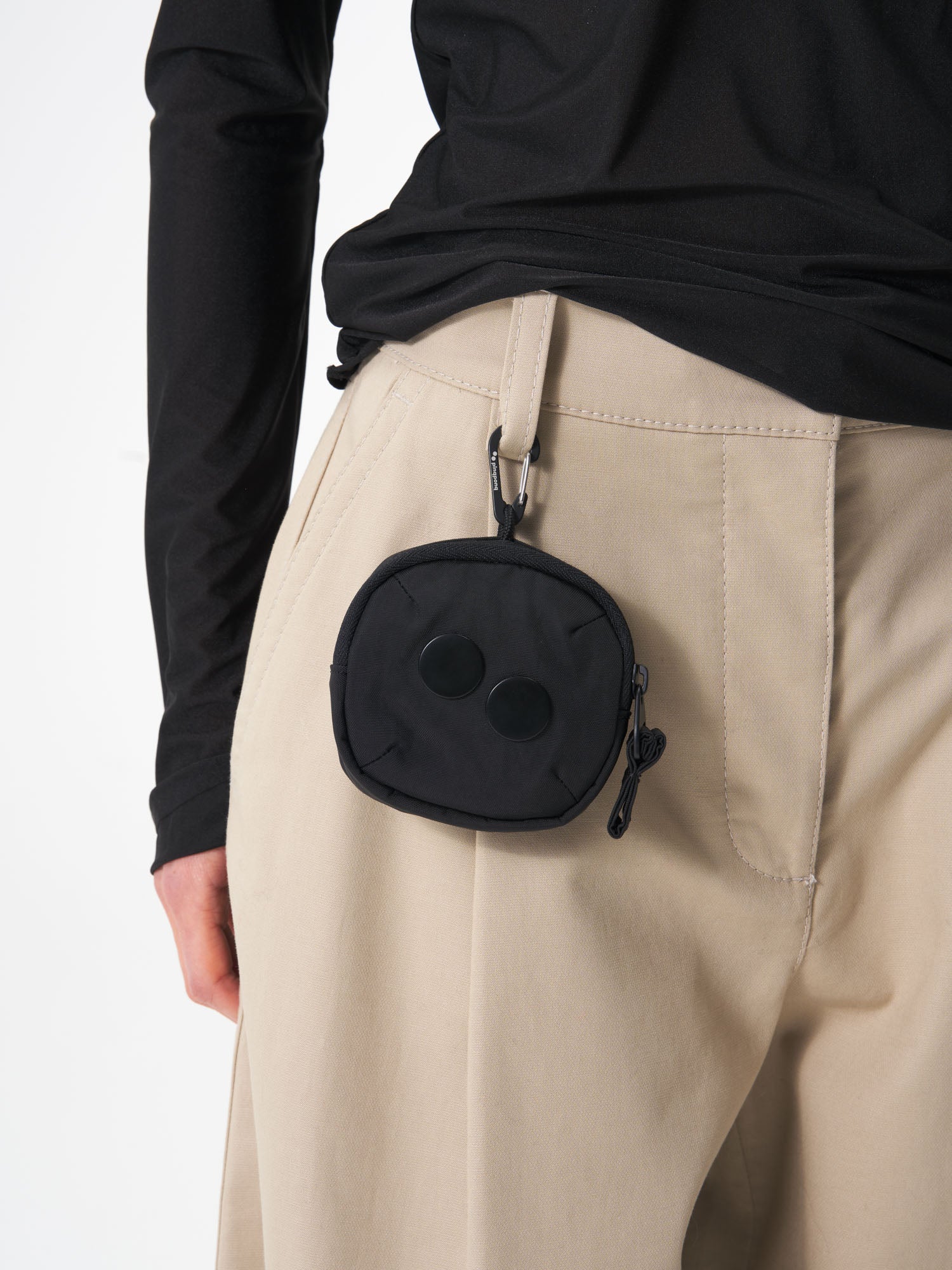 pinqponq-Mini-Pouch-Crinkle-Black-model-female-closeup-details