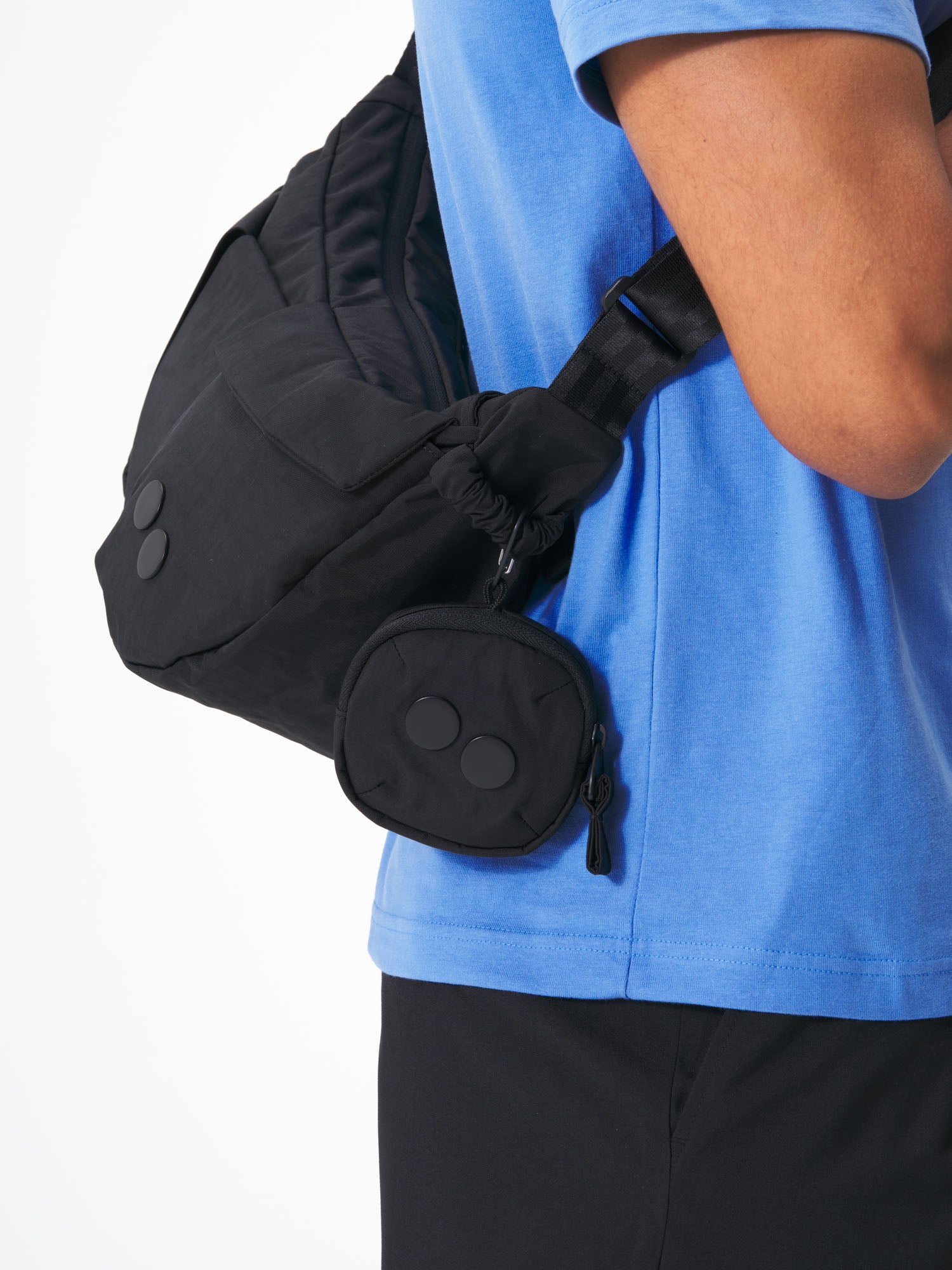 pinqponq-Mini-Pouch-Crinkle-Black-model-male-closeup-details